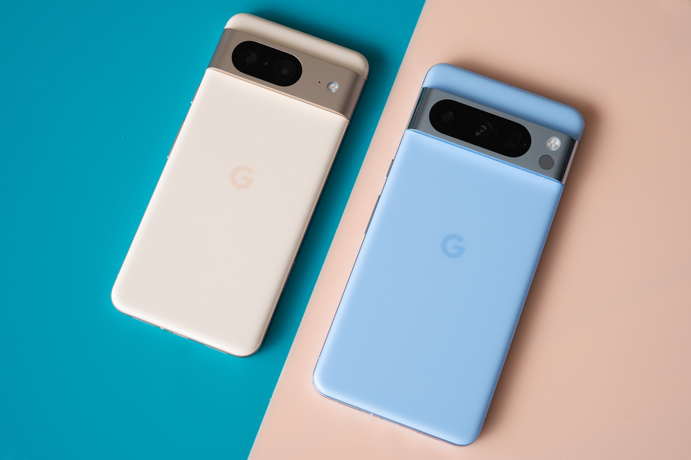 Google Pixel 8 and Pixel 8 Pro on blue and pink backgrounds showing rear panels.