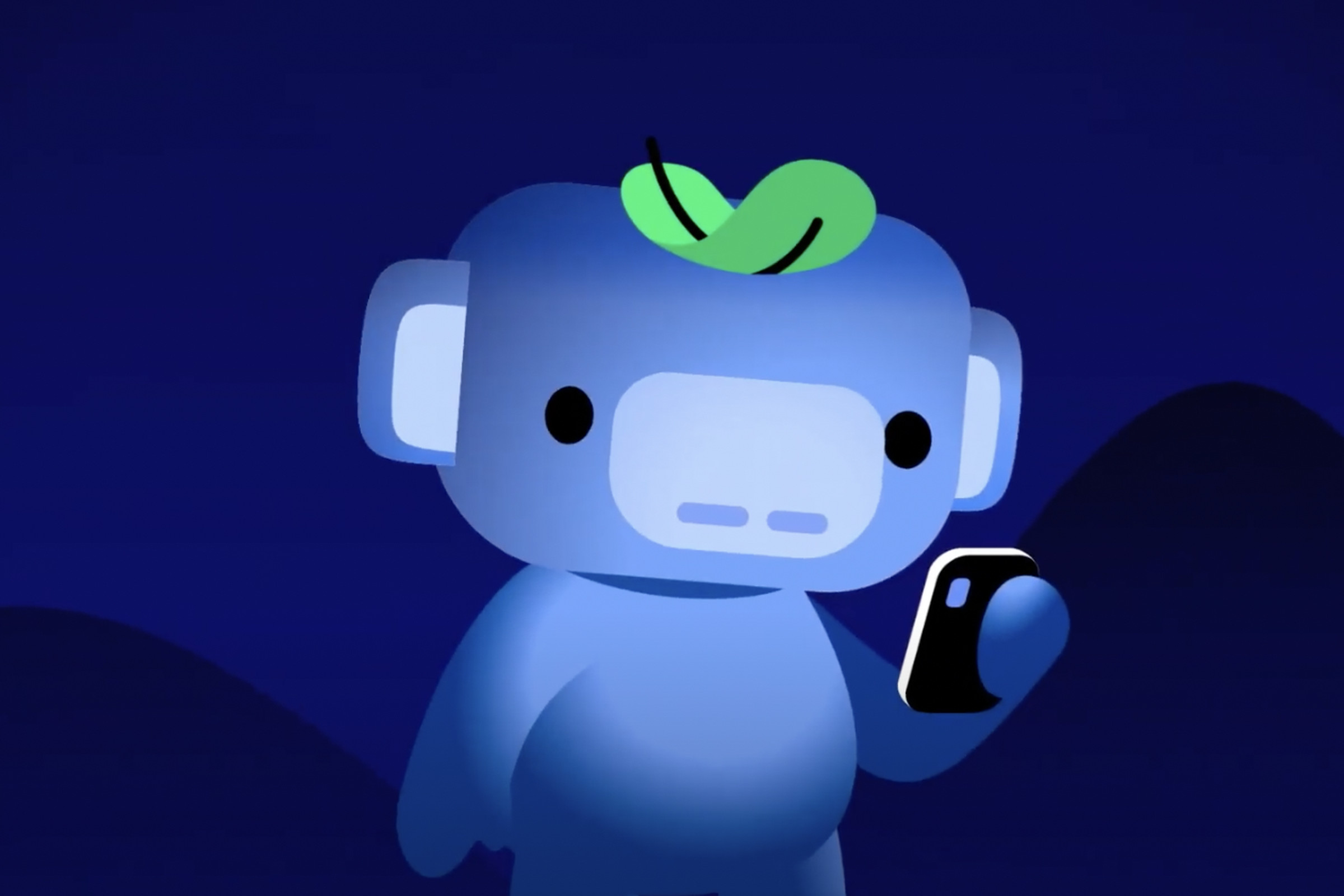Image of Discord mascot Wumpus happily engaged with his phone.