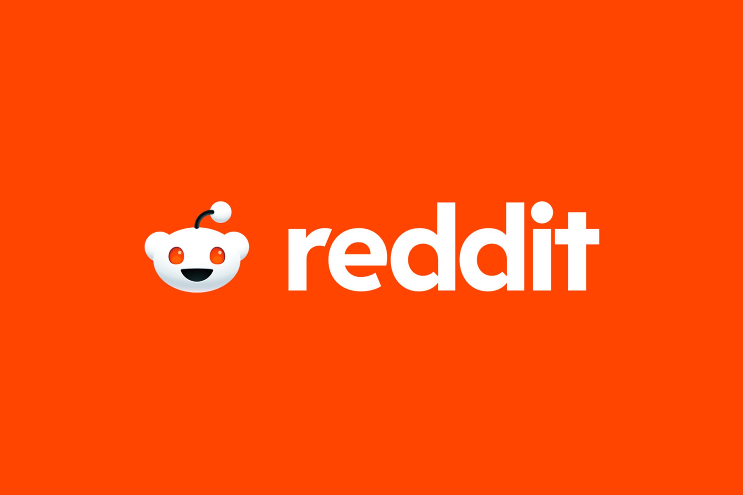 Image of the Reddit logo on a red-orange background.